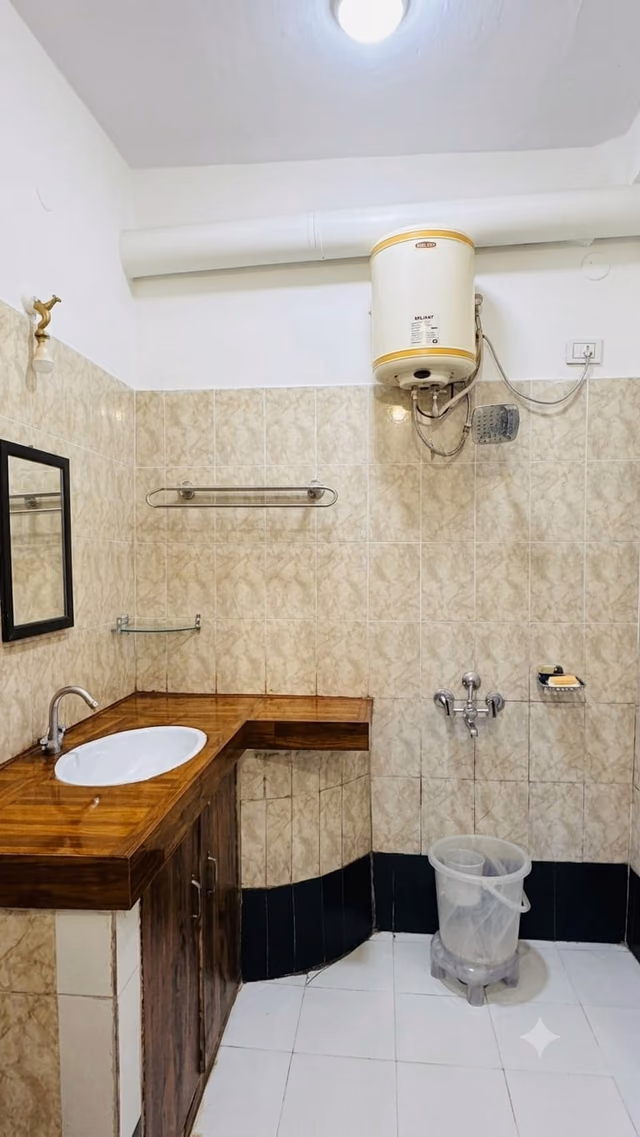 Attached bathroom in Deluxe room 204