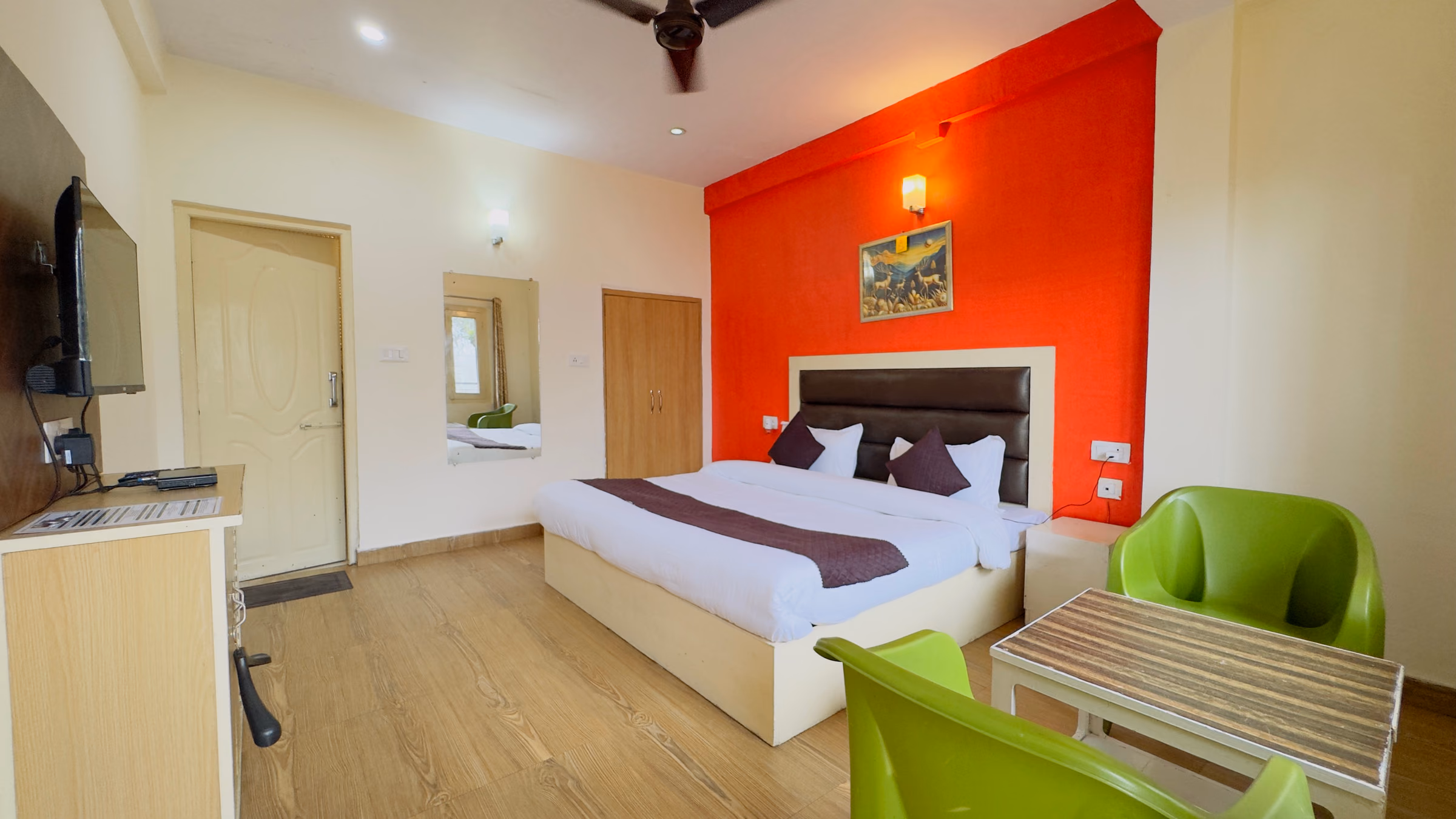 Bed and furnishings in Deluxe room 207