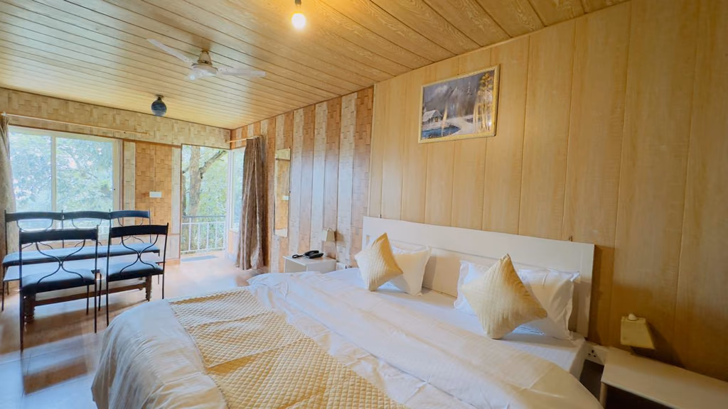 Bed area of Deluxe room 302