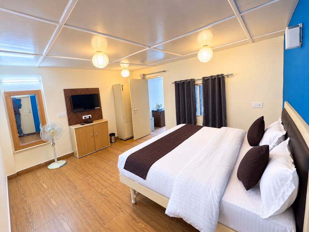 Bedside lantern lighting in room 105, Luxury King
