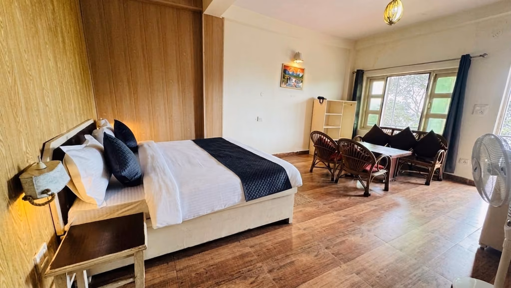 Standard room 202 with dual bed and table