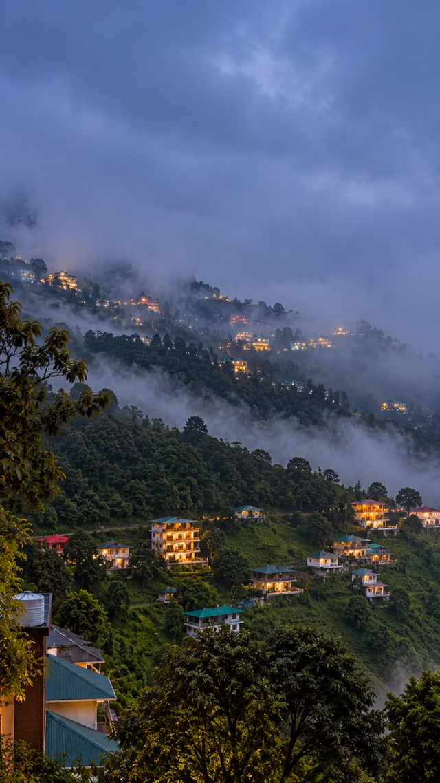 Mist settling over the valley at dusk, seen from The Sky Hotels